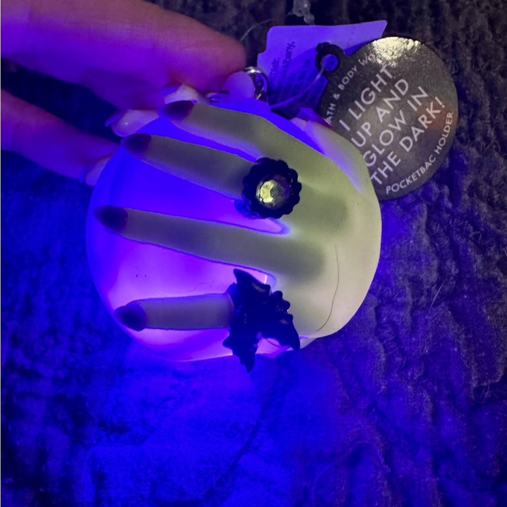 Glow-in-the-Dark Sanitizer Holder with Black Accents